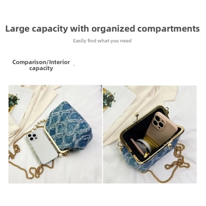 Macro view of interior compartments and denim fabric detail of the vintage chain bag