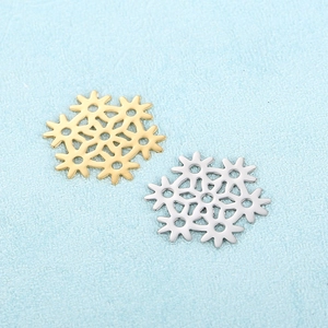 Exquisite gold and silver snowflake charms in cutout stainless steel for jewelry making