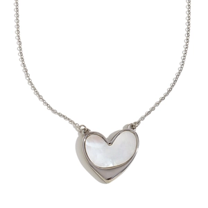 Minimalist silver chain necklace with a heart-shaped mother of pearl shell pendant