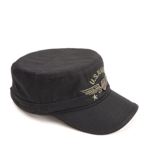 Detail of black cotton patrol cap featuring U.S. Navy embroidery and metal shield badge