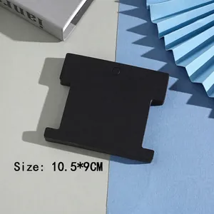 Detail showing stack of black T-shaped jewelry display cards with dimensions 10.5x9cm