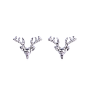 Close-up of silver elk head stud earrings for Christmas, minimalist metal holiday jewelry