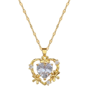 Gold titanium steel necklace featuring a heart-shaped zircon pendant and small floral accents