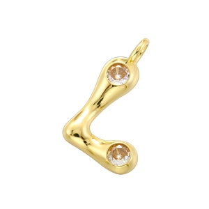 Detailed macro view of 18K gold-plated bamboo style L-letter pendant with brown gems