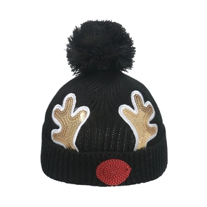 Kids black knit Christmas hat with sequin deer antlers and large faux fur pompom