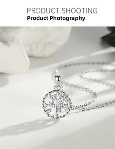 Macro shot of S925 sterling silver Tree of Life pendant with white cubic zirconia stones