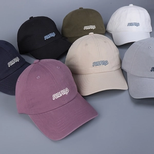 Various washed cotton baseball caps with Surfing embroidery shown in multiple colors
