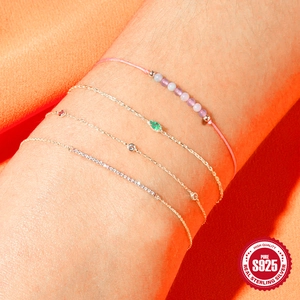 S925 sterling silver bracelet set with green zircon stones on female model wrist