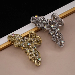 Vintage hollow flower hair claws in gold and silver metal with colorful rhinestones