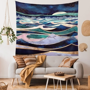 Detailed close-up of mountain landscape wall tapestry with golden edges for home decor