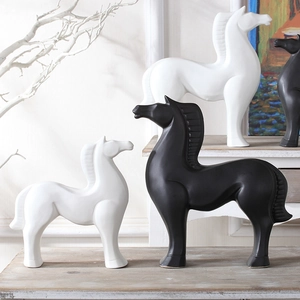 Modern minimalist horse statues in black and white finish for home decor accents