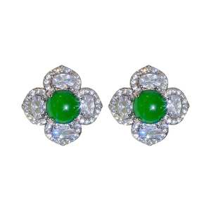 Hollow flower stud earrings with green center stone and white zircon accents
