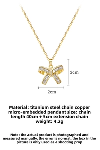 Detailed view of butterfly pendant with pavé cubic zirconia on a titanium steel chain