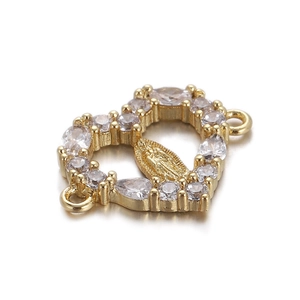Detailed view of 18K gold plated heart pendant with portrait carving and clear zircons