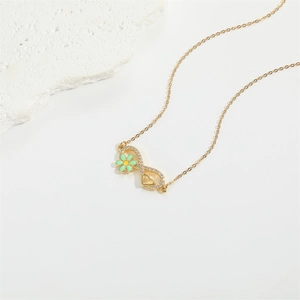 Infinity pendant necklace with heart, mint green flower and pave cubic zirconia