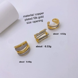 Tre anelli in rame placcati oro 18 carati con zirconi e design aperto regolabile
