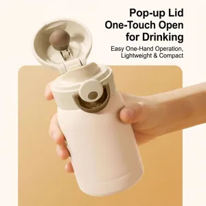 Mini stainless steel vacuum flask with a one-hand operation bounce lid in beige