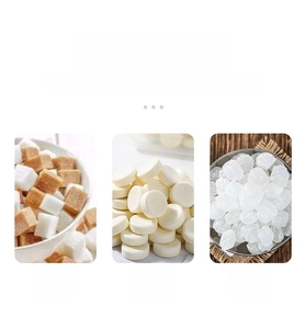 Detail view of thickened 304 stainless steel tongs clamping sugar cubes, milk tablets, and ice