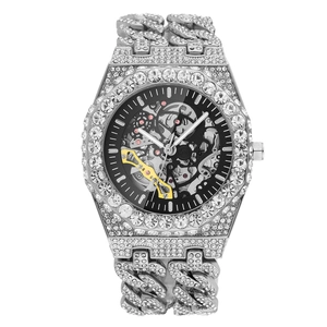 Silver iced-out hip hop watch with black hollow skeleton dial and crystals