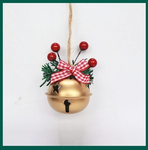 Detail showing golden Christmas bell with red bow, berries, and jute rope hanging