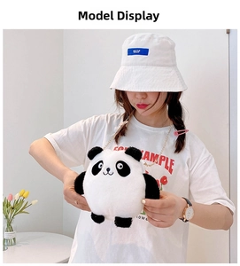 Detail of cute panda plush bag with gold chain strap worn by a model in casual outfit