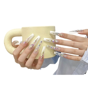 Handgefertigte lange Sargnägel zum Aufkleben mit weißem Rand, Glitzer und glänzenden Strass