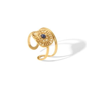 Detail of gold-plated square open ring with sunburst rays and blue lapis lazuli stone