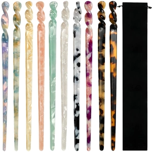 Set of 10 tortoiseshell acetate spiral hair pins with a black velvet storage pouch