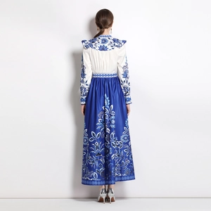 French vintage A-line dress with blue floral print and sleek satin waist-slimming fit