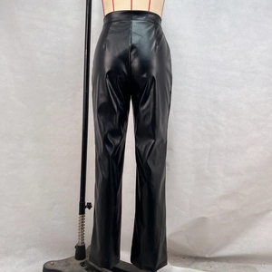 Rear view of black high-waisted PU leather straight trousers on a mannequin