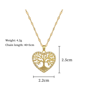 Golden heart necklace with tree of life design and crystals, size 2.5cm by 2.2cm