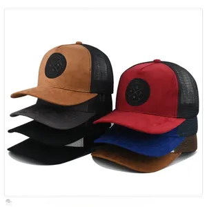 Detail view of multicolored suede trucker hats with breathable mesh and round patch