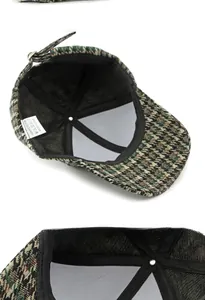 Detailed macro view of the houndstooth baseball cap's inner lining and material label