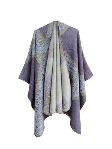 Detailed view of paisley and floral jacquard patterns on purple and gray acrylic shawl