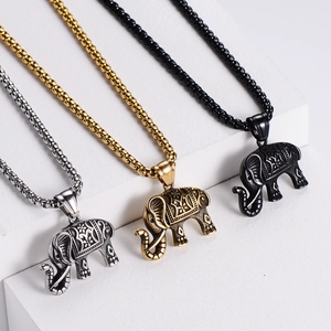Ethnic vintage African elephant pendant necklace set in silver, gold, and black finishes