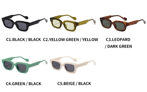 Close-up of rectangular sunglasses with thick frames in various macaron colors