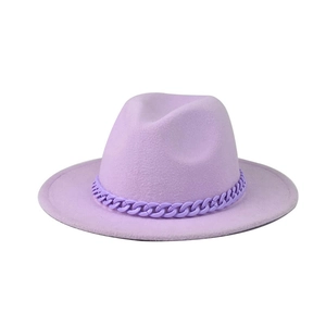 Detail of lavender fedora hat showing textured wool felt and matte chain decoration