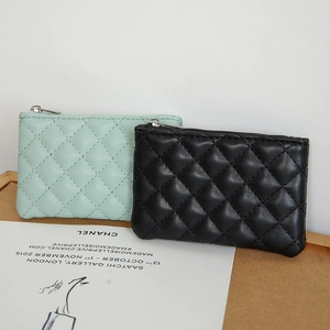 Diamond quilted PU leather coin purses in mint green and black with top zippers