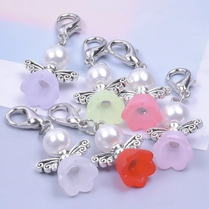 Guardian angel charms with pearl heads and colorful skirts for wedding party favors
