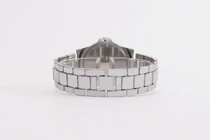 Detail view of the silver metallic watch back and linked stainless steel strap construction