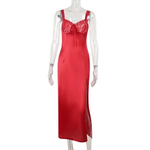 Detail of red satin dress with lace V-neck trim and high side slit on model