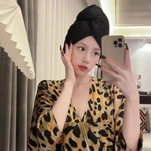 Absorbent black faux silk hair drying cap for long hair, shown in a mirror selfie