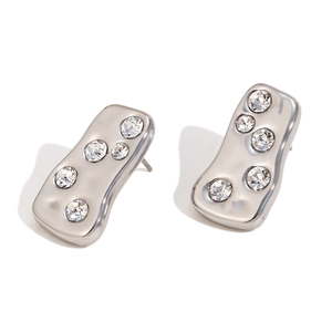 Irregular silver wavy stud earrings with sparkling crystals in 18K gold plating