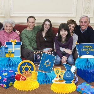 Hanukkah party honeycomb centerpieces featuring Star of David and Menorah designs