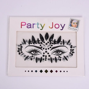Face crystal stick-on jewels with black and silver rhinestones for party makeup looks