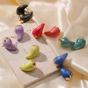 Fashionable teardrop stud earrings with marble texture and gold accents in multiple colors