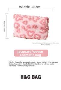 Détails de la trousse de maquillage rose en peluche avec motifs cœurs, taille 26x18cm