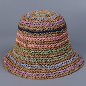 Detailed close-up of colorful striped handmade crochet straw bucket hat with woven texture