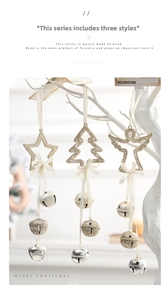 Detailed view of glittery Christmas tree star and angel ornaments with small metal bells