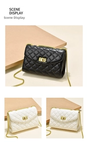 Detail view of quilted chain bags in black and white with golden metal twist locks